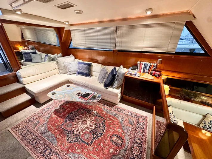 Sea Suite Yacht Photos Pics Luxurious interior of 1989 Viking 44 Motor Yacht with elegant seating and decor.