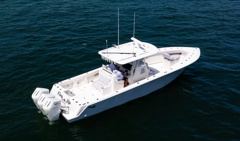 Finns Up Yacht Photos Pics 2024 SeaVee Open Fisherman 390Z boat on water, featuring twin outboard engines.