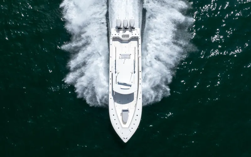 Finns Up Yacht Photos Pics 2024 SeaVee Open Fisherman 390Z speeding on water, aerial view.