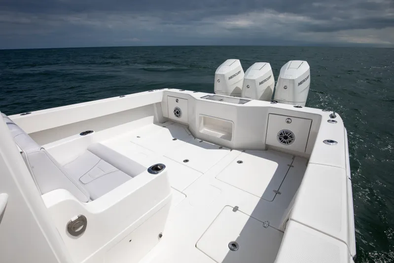 Finns Up Yacht Photos Pics 2024 SeaVee Open Fisherman 390Z boat with triple Mercury engines on open sea.