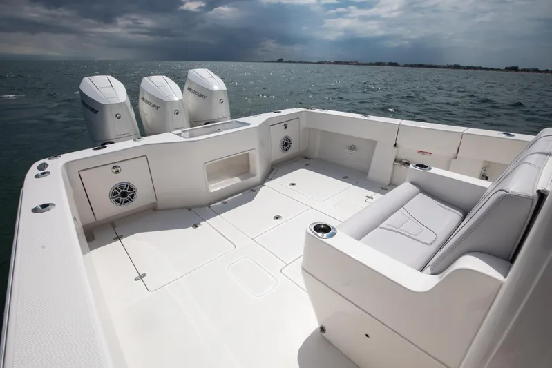 Finns Up Yacht Photos Pics 2024 SeaVee Open Fisherman 390Z boat with triple Mercury engines on open water.