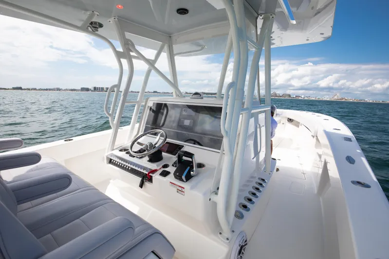 Finns Up Yacht Photos Pics 2024 SeaVee Open Fisherman 390Z boat on water, featuring modern helm and seating.