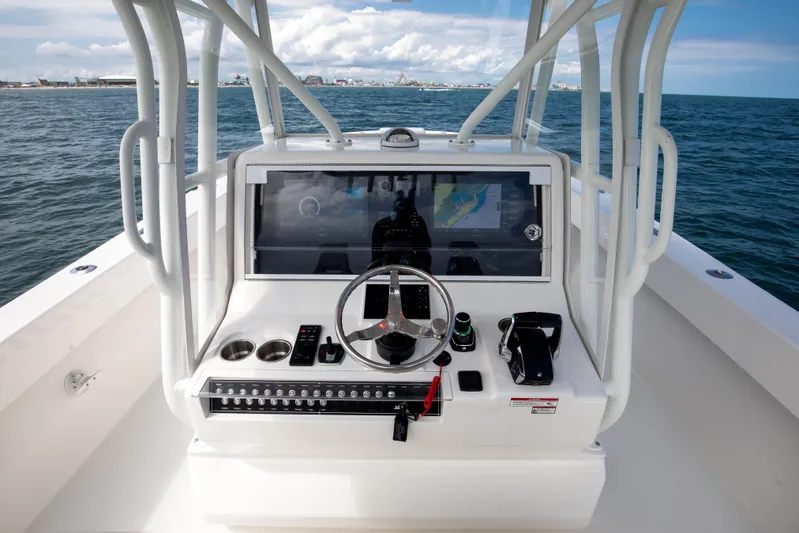 Finns Up Yacht Photos Pics 2024 SeaVee Open Fisherman 390Z helm with modern navigation system on open water.