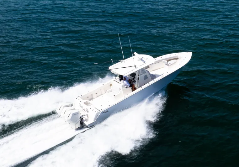 Finns Up Yacht Photos Pics 2024 SeaVee Open Fisherman 390Z cruising on open water, showcasing speed and design.