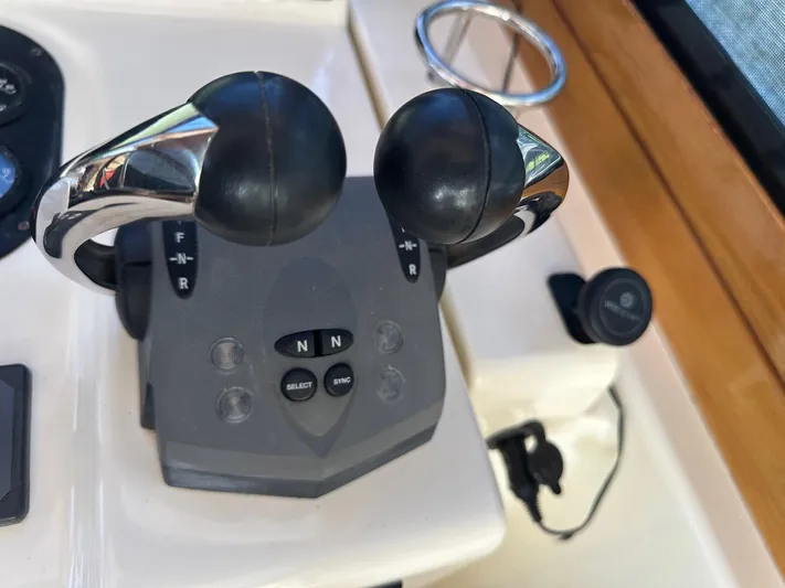 True Blue Yacht Photos Pics Throttle controls on a 2005 Sabre 42 Express boat dashboard.