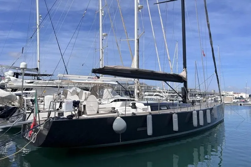 SueÑo Yacht Photos Pics Luxury 2016 Ice Yachts 62 sailboat docked in marina under clear blue sky.