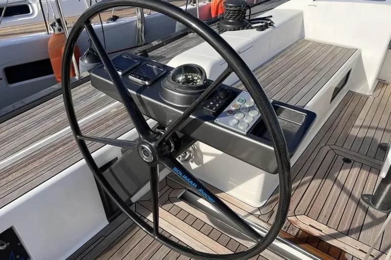 SueÑo Yacht Photos Pics Steering wheel of 2016 Ice Yachts 62, featuring sleek design and modern controls.