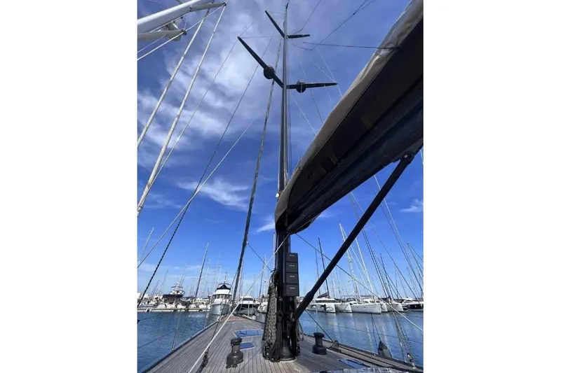 SueÑo Yacht Photos Pics Sailing yacht Ice Yachts 62, 2016 model, docked with clear blue sky background.