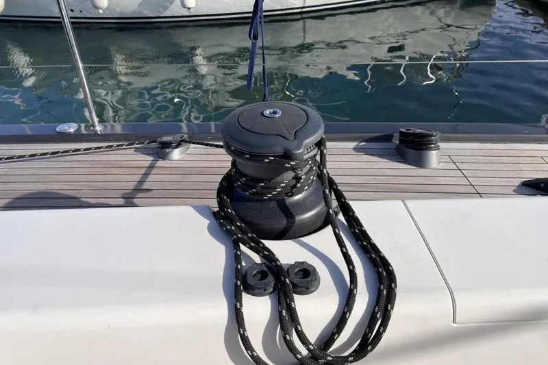 SueÑo Yacht Photos Pics Deck of 2016 Ice Yachts 62 with winch and ropes, docked at marina.