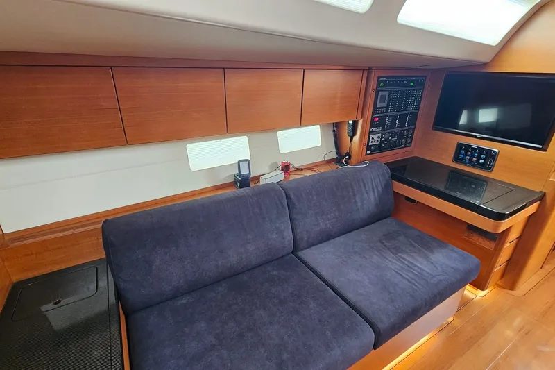 SueÑo Yacht Photos Pics Luxurious interior of 2016 Ice Yachts 62 with plush seating and modern control panel.