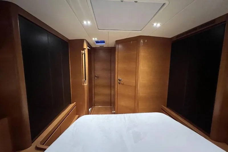 SueÑo Yacht Photos Pics Luxurious interior cabin of 2016 Ice Yachts 62, featuring elegant wood finishes.