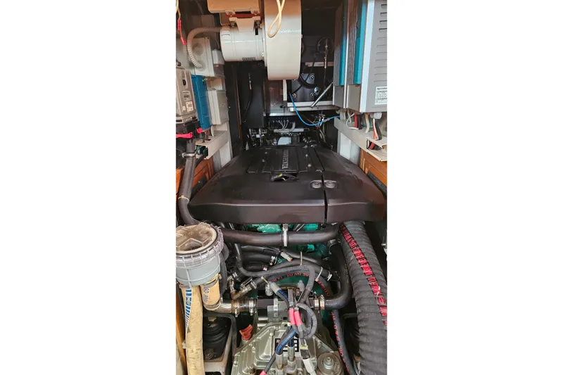 SueÑo Yacht Photos Pics Engine room of a 2016 Ice Yachts 62, showcasing complex machinery and components.