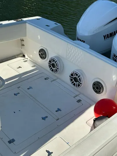  Yacht Photos Pics 2004 Intrepid Outboard boat deck with Yamaha engines and marine speakers.