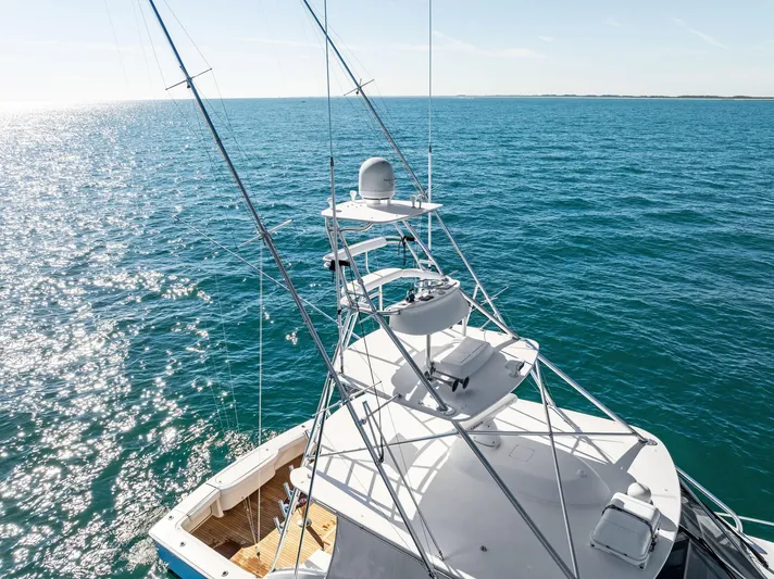 Hog Wild Yacht Photos Pics 2007 Viking 52 Open yacht on open sea, sunny day, aerial view.