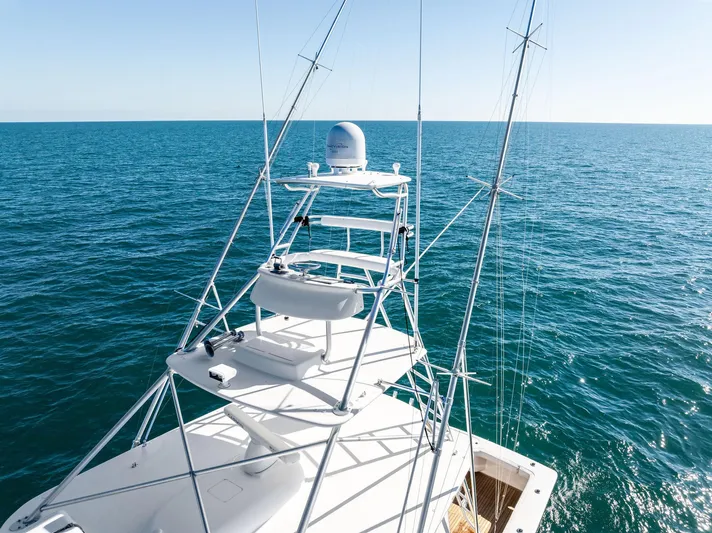 Hog Wild Yacht Photos Pics 2007 Viking 52 Open yacht on open sea, showcasing tower and ocean view.