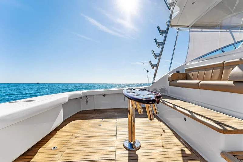 Hog Wild Yacht Photos Pics 2007 Viking 52 Open yacht deck with ocean view and sunny sky.