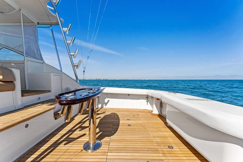 Hog Wild Yacht Photos Pics 2007 Viking 52 Open yacht deck with ocean view and clear blue sky.