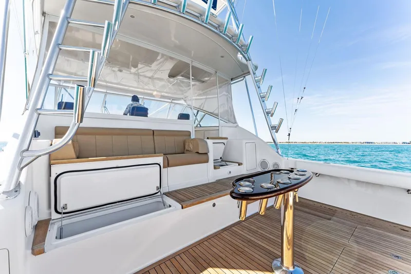 Hog Wild Yacht Photos Pics 2007 Viking 52 Open yacht interior with seating and fishing equipment.