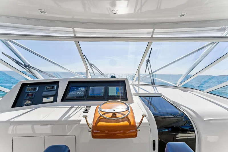 Hog Wild Yacht Photos Pics 2007 Viking 52 Open yacht helm with ocean view and navigation instruments.