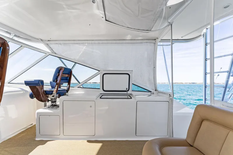 Hog Wild Yacht Photos Pics 2007 Viking 52 Open yacht interior with helm seat and ocean view.