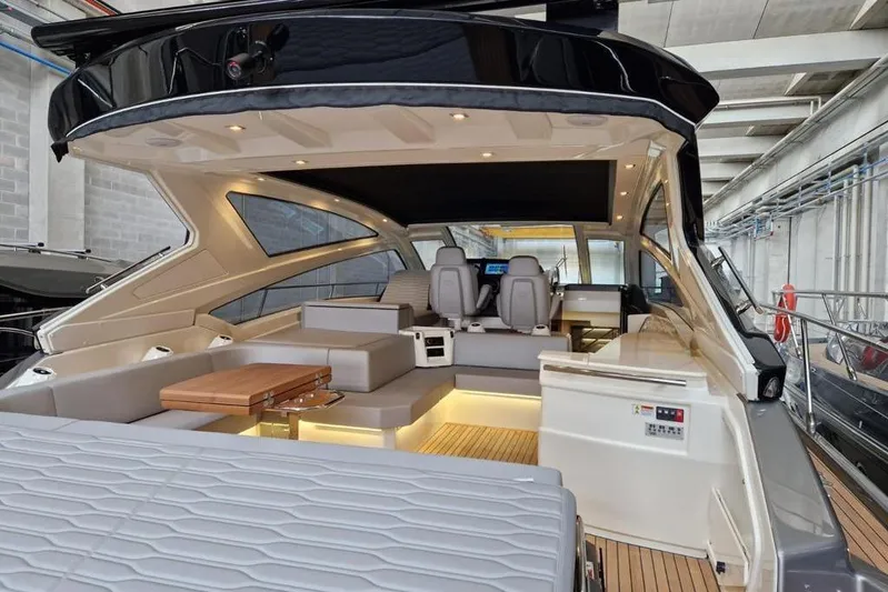 Cranchi St 60 2023 Yacht Photos Pics Luxurious 2023 Cranchi 60 ST yacht interior with modern seating and elegant design.