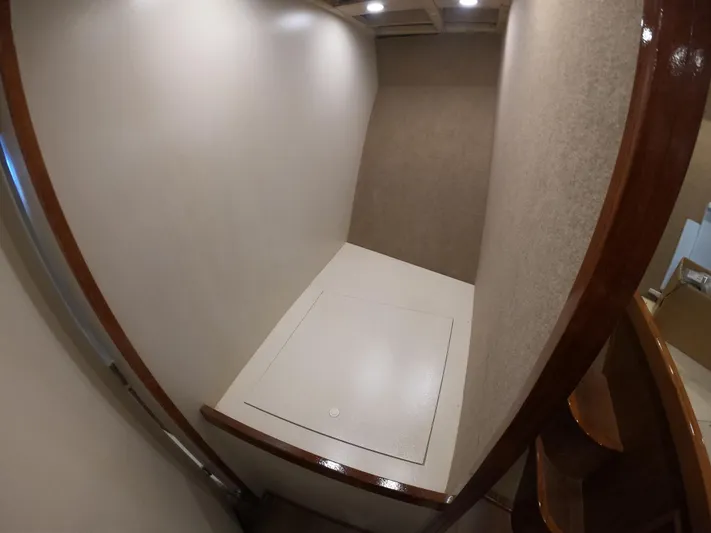  Yacht Photos Pics Interior of 2005 Custom Carolina C 30 CAT boat with storage compartment.