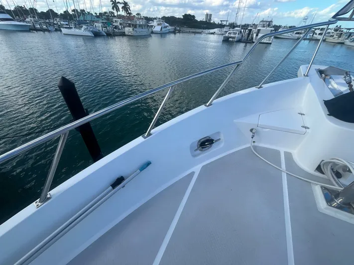 September Song Yacht Photos Pics 2007 DeFever 55 yacht deck view in marina.