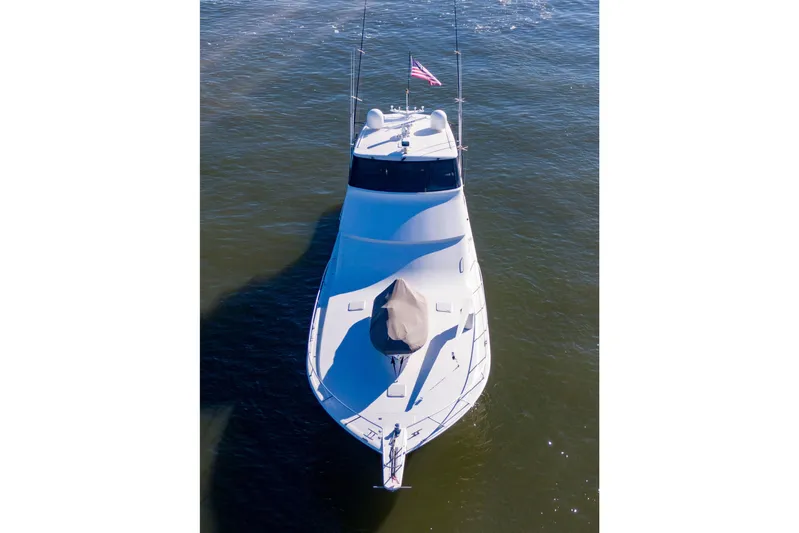 Prime Time Yacht Photos Pics 2002 Viking 65 Enclosed Bridge yacht on open water, aerial view.