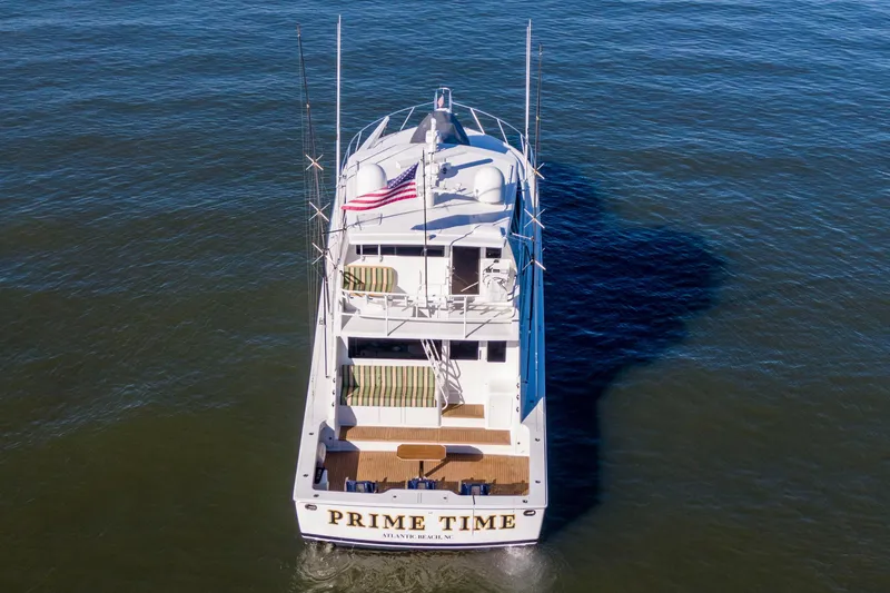 Prime Time Yacht Photos Pics Aerial view of 2002 Viking 65 Enclosed Bridge yacht on open water.