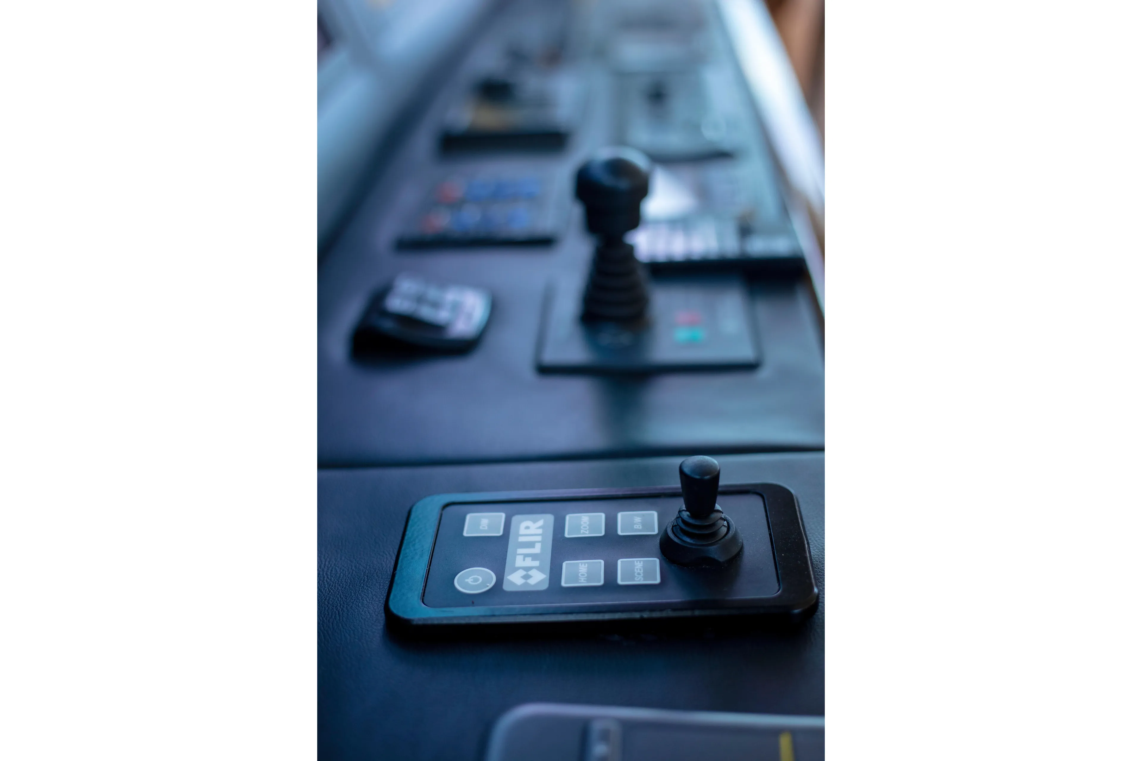 Prime Time Yacht Photos Pics Control panel of 2002 Viking 65 Enclosed Bridge yacht with joystick and FLIR system.