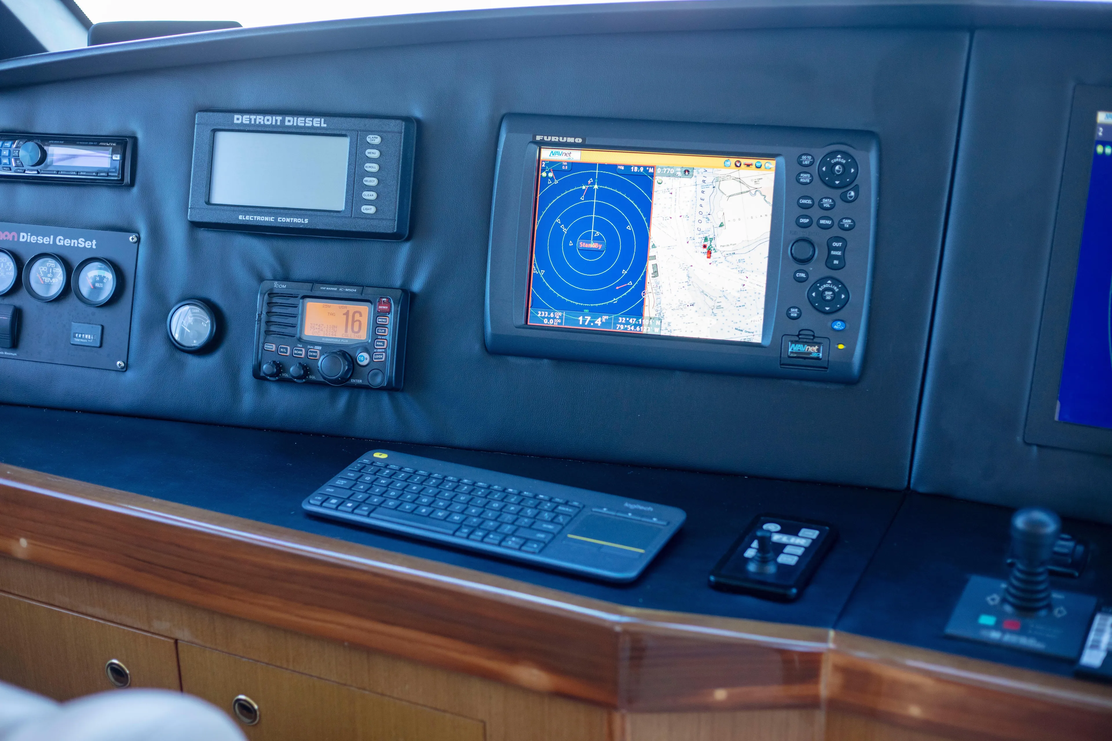 Prime Time Yacht Photos Pics Control panel of 2002 Viking 65 Enclosed Bridge yacht with navigation and communication equipment.