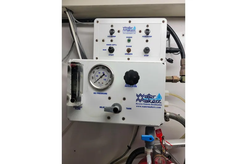 Prime Time Yacht Photos Pics Reverse osmosis desalination system on 2002 Viking 65 Enclosed Bridge yacht.