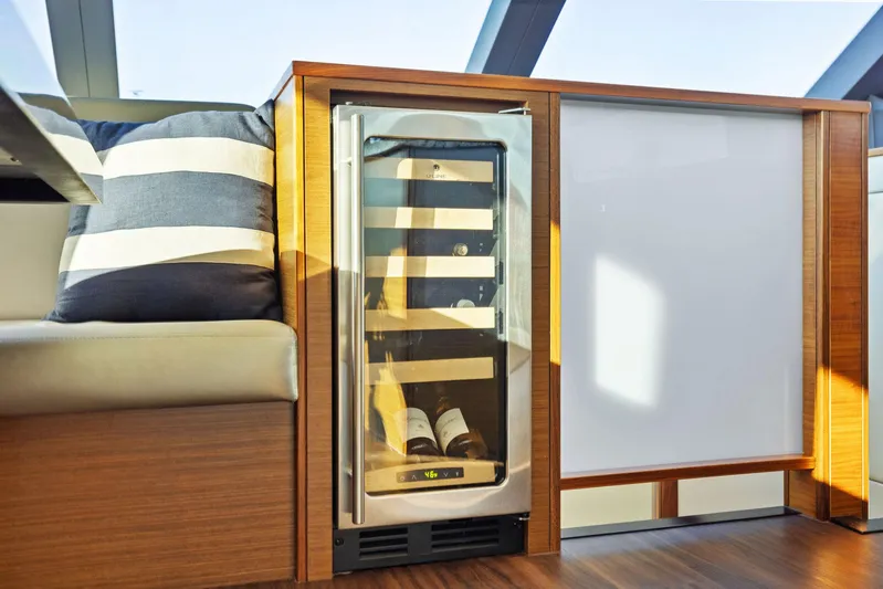 Bonefish Yacht Photos Pics Luxury yacht interior with wine cooler, Hatteras M60, 2016 model.