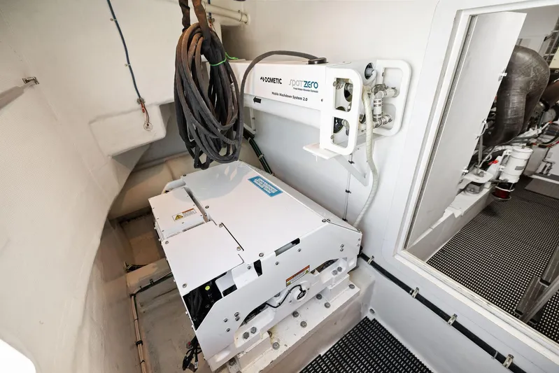 Bonefish Yacht Photos Pics Engine room of 2016 Hatteras M60 yacht with advanced equipment and cables.