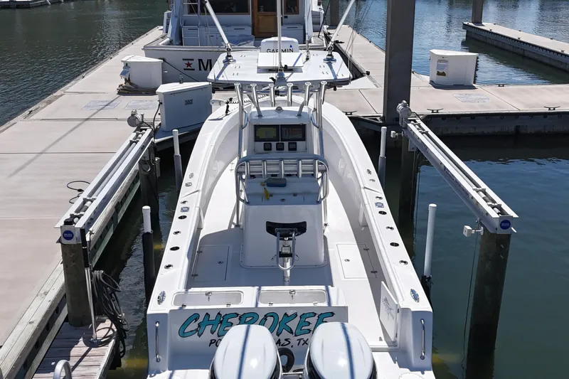 Cherokee Yacht Photos Pics 2022 Ocean Runner 29 Center Console boat docked at marina.