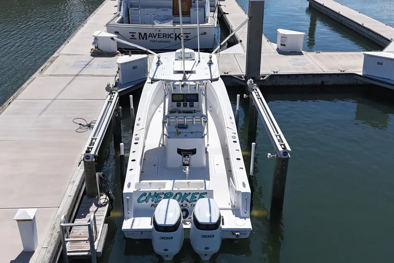 Cherokee Yacht Photos Pics 2022 Ocean Runner 29 Center Console boat docked with twin engines.
