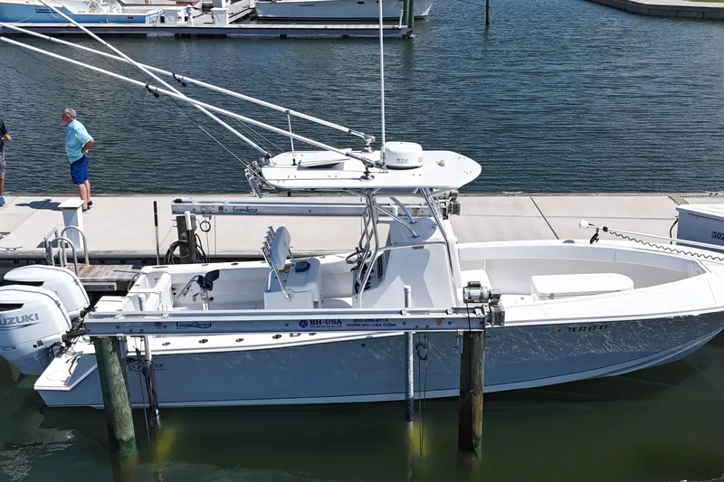 Cherokee Yacht Photos Pics 2022 Ocean Runner 29 Center Console boat docked at marina with Suzuki engines.