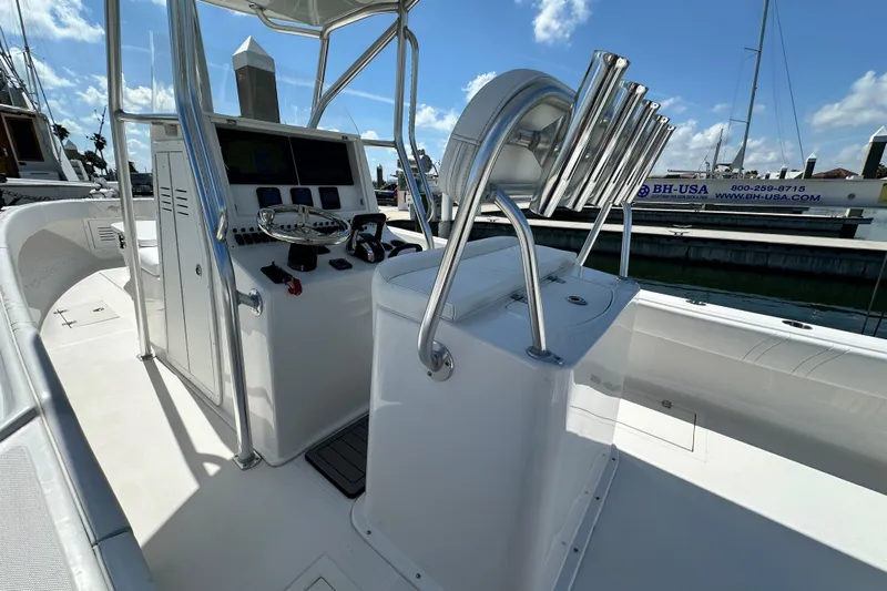 Cherokee Yacht Photos Pics 2022 Ocean Runner 29 Center Console boat interior with steering and rod holders.