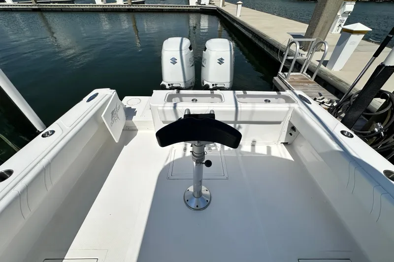 Cherokee Yacht Photos Pics 2022 Ocean Runner 29 Center Console boat with dual engines docked at marina.
