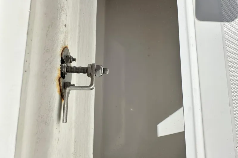 Cherokee Yacht Photos Pics Close-up of a metal bolt on a 2022 Ocean Runner 29 Center Console boat.