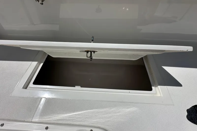Cherokee Yacht Photos Pics Open storage compartment on 2022 Ocean Runner 29 Center Console boat.