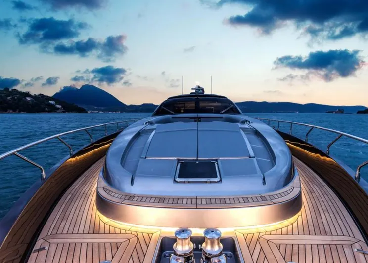  Yacht Photos Pics Luxurious 2017 Riva 88' Domino Super yacht at sunset on open water.