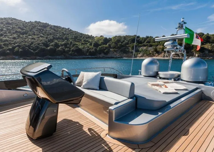  Yacht Photos Pics Luxurious 2017 Riva 88' Domino Super yacht deck with elegant seating and scenic ocean view.