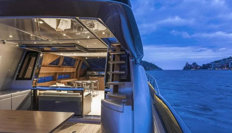  Yacht Photos Pics Luxurious 2017 Riva 88' Domino Super yacht interior with ocean view at dusk.
