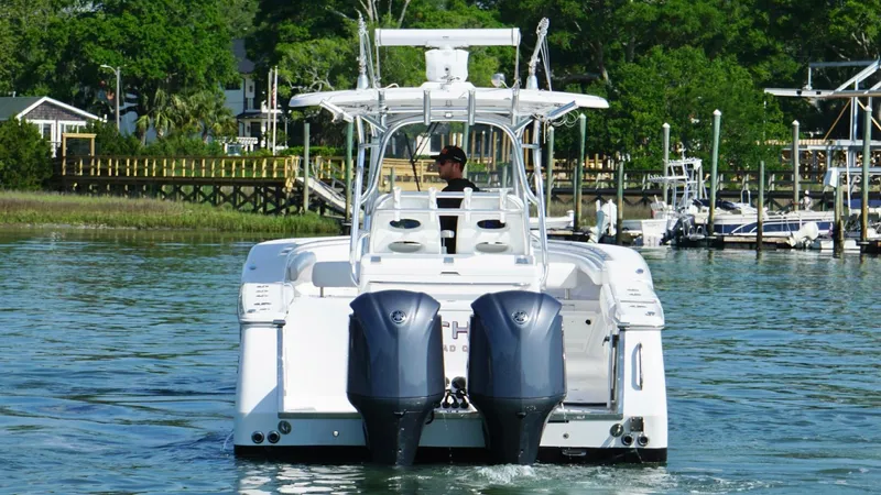  Yacht Photos Pics 2018 Southport 33 FE boat with dual engines on a calm waterway.