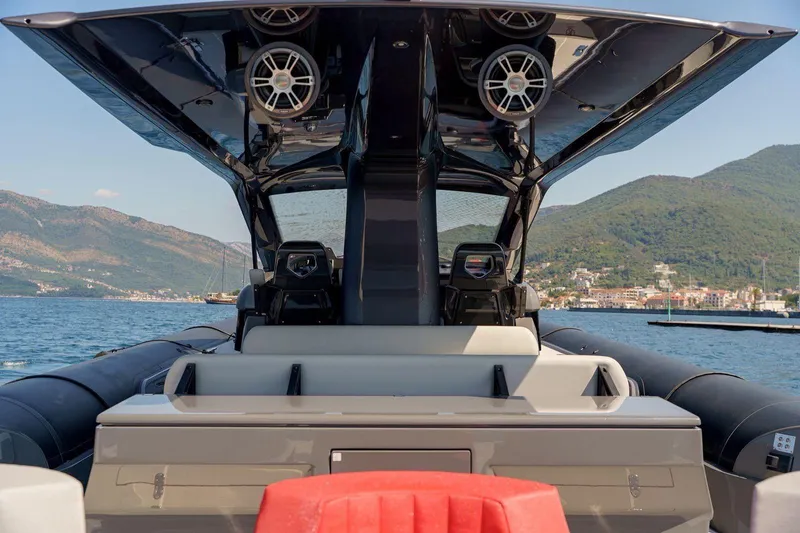  Yacht Photos Pics 2023 Anvera 48 luxury boat with sleek design, on scenic water backdrop.