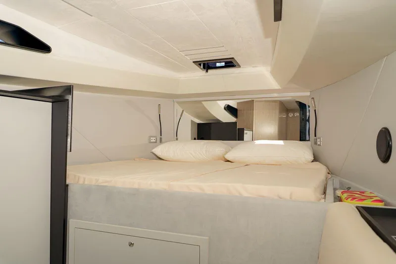  Yacht Photos Pics Luxurious interior cabin of 2023 Anvera 48 yacht with comfortable bedding.
