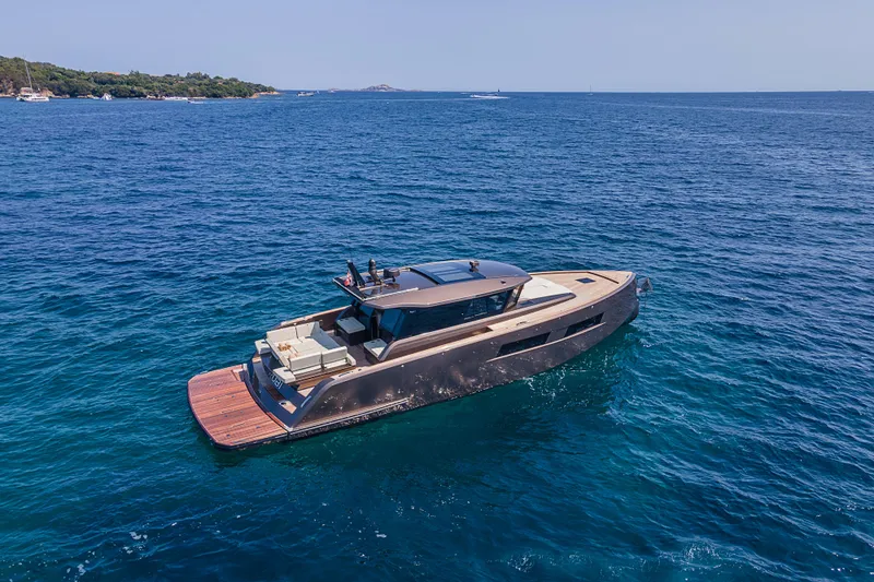 M/y Rubi Yacht Photos Pics 2024 Pardo Yachts GT52 cruising on open blue sea, showcasing sleek design and luxury.