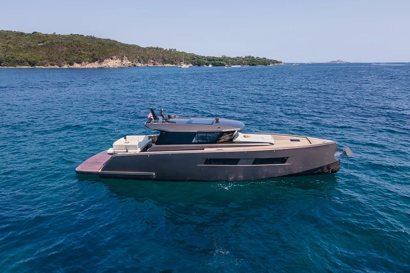 M/y Rubi Yacht Photos Pics 2024 Pardo Yachts GT52 cruising on clear blue waters.