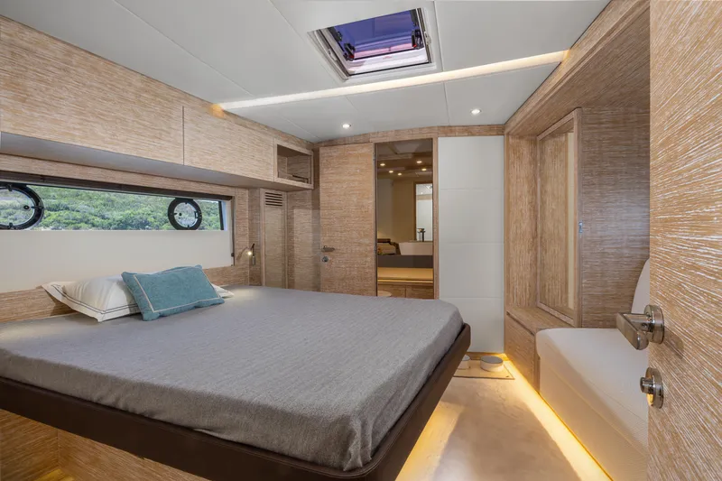 M/y Rubi Yacht Photos Pics Luxurious bedroom interior of 2024 Pardo Yachts GT52, featuring modern design and natural lighting.